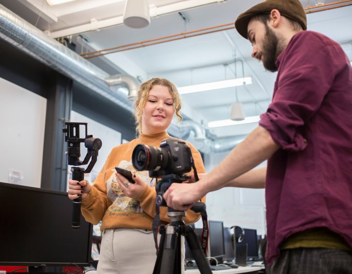Journalism and Creative Writing students with equipment